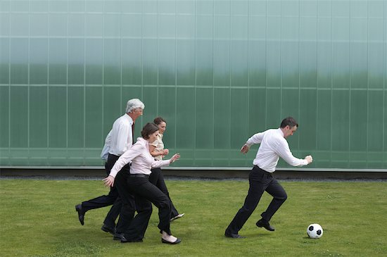 Business People Playing Soccer Stock Photo - Premium Rights-Managed, Artist: Masterfile, Image code: 700-01464181