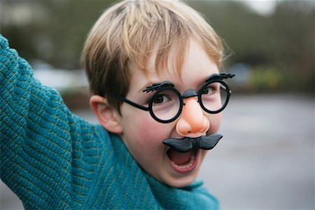 fake moustache - Portrait of Boy with Nose and Moustache Disguise Stock Photo - Rights-Managed, Code: 700-01464572