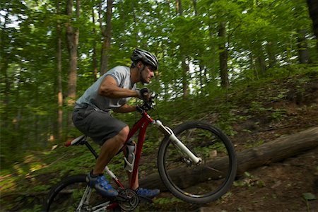 Mann-Mountainbike Stockbilder - Lizenzpflichtiges, Bildnummer: 700-01494522