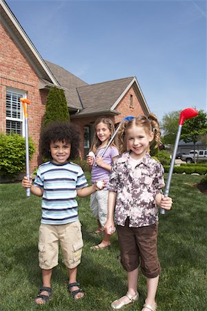 family house three people outdoors play - Children Golfing on Lawn Stock Photo - Rights-Managed, Code: 700-01494601