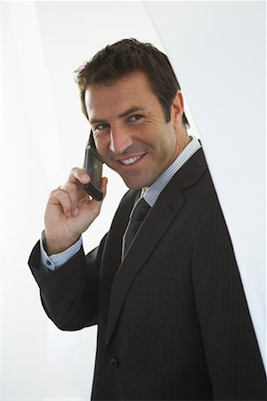 simsearch:700-00604334,k - Businessman Talking on Cell Phone Foto de stock - Con derechos protegidos, Código: 700-01494688