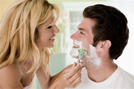 shaving man woman - Woman Shaving Man Stock Photo - Rights-Managed, Code: 700-01519503