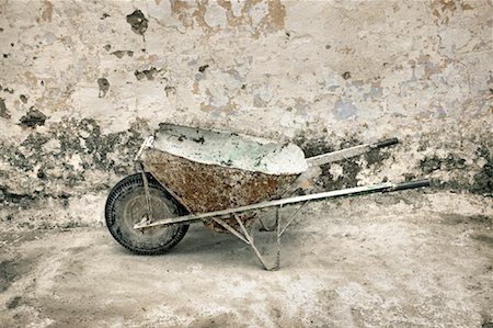 dirty building - Wheelbarrow Stock Photo - Rights-Managed, Code: 700-01538796