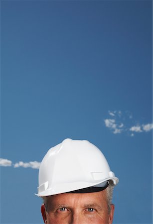 Man Wearing Hard Hat Stock Photo - Rights-Managed, Code: 700-01575490