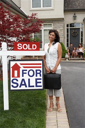sold - Real Estate Agent by House with Sold Sign Stock Photo - Rights-Managed, Code: 700-01571961