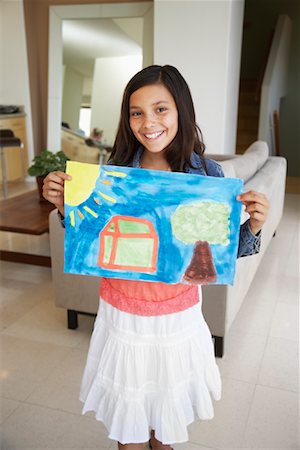 Girl Displaying Painting Stock Photo - Rights-Managed, Code: 700-01572091