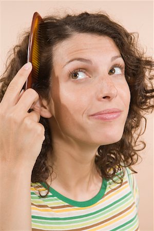 simsearch:700-01586129,k - Woman Combing Hair Stock Photo - Rights-Managed, Code: 700-01586133
