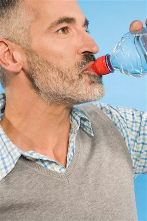 Man Drinking Bottled Water Stock Photo - Rights-Managed, Code: 700-01586217