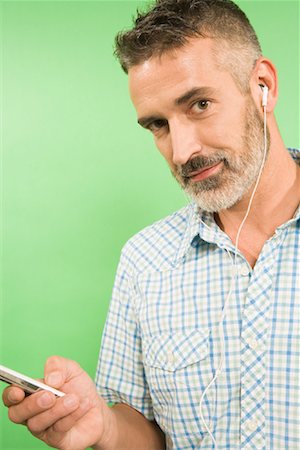 earbuds - Homme avec lecteur Audio Portable Photographie de stock - Rights-Managed, Code: 700-01586223