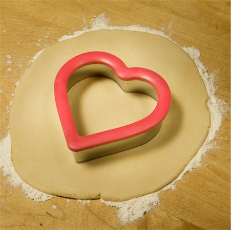 Heart Shaped Cookie Cutter in Dough Stock Photo - Rights-Managed, Code: 700-01586805