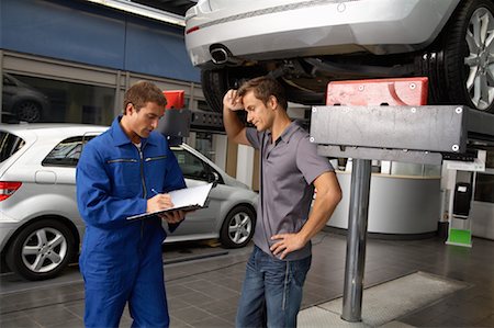 simsearch:600-01575563,k - Mechanic and Man in Garage Foto de stock - Con derechos protegidos, Código: 700-01587047