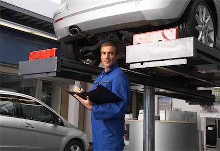 factory worker reaching - Portrait of Mechanic Stock Photo - Rights-Managed, Code: 700-01587056