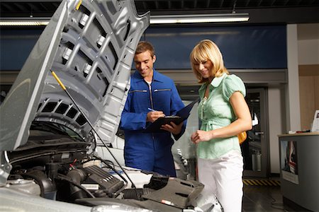 Mechanic and Woman in Garage Stock Photo - Rights-Managed, Code: 700-01587121
