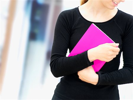 fluorescent (color) - Woman Holding Colourful File Folder Foto de stock - Con derechos protegidos, Código: 700-01587490