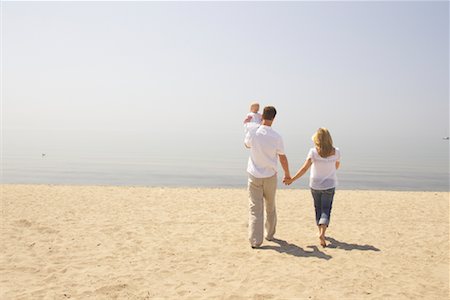 dad son hold hand walk back - Family at Beach Stock Photo - Rights-Managed, Code: 700-01582158