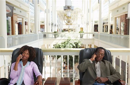 People at the Mall, Talking on Cellular Phones Stock Photo - Rights-Managed, Code: 700-01594058