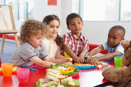 eating in the classroom - Children Eating at Daycare Stock Photo - Rights-Managed, Code: 700-01593809