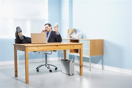 Businessman at Desk Stock Photo - Rights-Managed, Code: 700-01606378