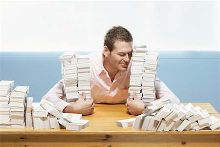 Man at Desk, Counting Money Stock Photo - Rights-Managed, Code: 700-01606387