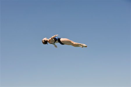 sky diver - Woman Springboard Diving Foto de stock - Con derechos protegidos, Código: 700-01607351