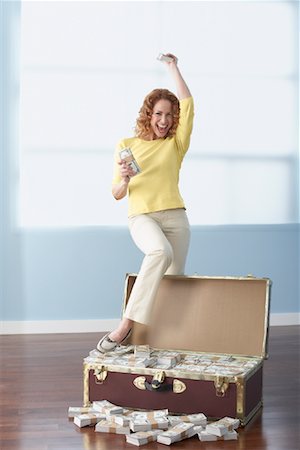 Woman with Chest Full of Money Stock Photo - Rights-Managed, Code: 700-01607374