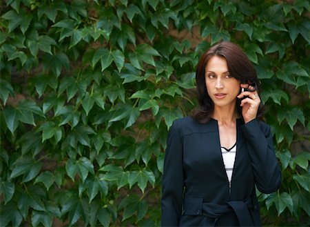Businesswoman Talking on Cellular Phone Foto de stock - Con derechos protegidos, Código: 700-01615273