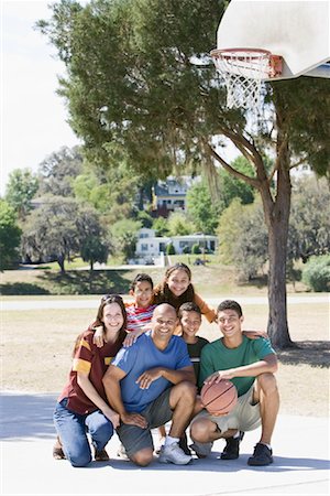 preteen thong - Portrait of Family on Basketball Court Stock Photo - Rights-Managed, Code: 700-01633024