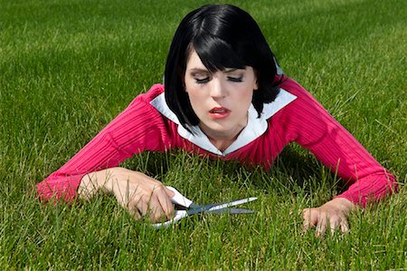 simsearch:700-01633292,k - Woman Cutting Grass With Scissors Stock Photo - Rights-Managed, Code: 700-01633314