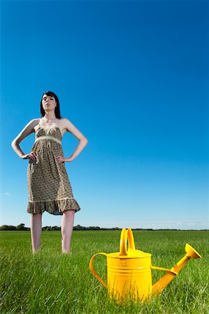 Woman With Watering Can Stock Photo - Rights-Managed, Code: 700-01633319