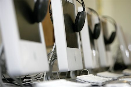 pc computer screen - Row of Computers with Headphones Stock Photo - Rights-Managed, Code: 700-01645228