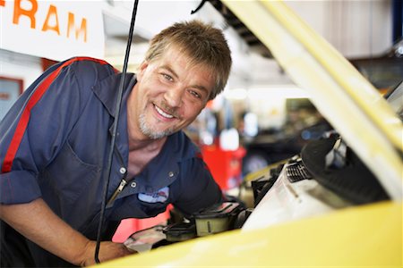 Mechanic Working on Car Stock Photo - Rights-Managed, Code: 700-01646216