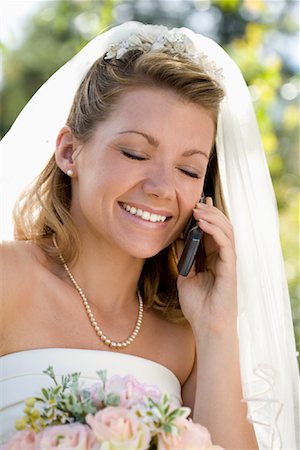 Bride Talking on Cell Phone Stock Photo - Rights-Managed, Code: 700-01646262