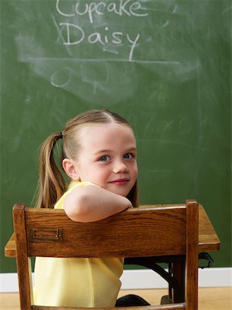 desk with wall - Girl at Desk in Classroom Stock Photo - Rights-Managed, Code: 700-01646361