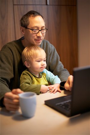 Father and Son with Laptop Computer Stock Photo - Rights-Managed, Code: 700-01694065