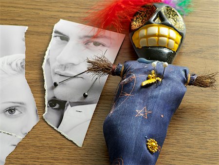 spell - Torn Photograph and Voodoo Doll Stock Photo - Rights-Managed, Code: 700-01694280