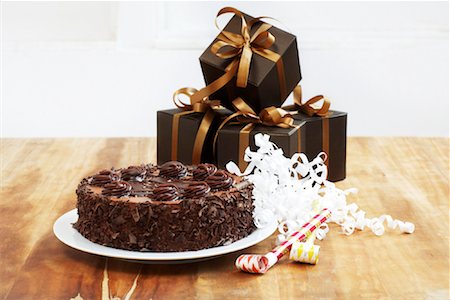 Chocolate Cake and Gifts Stock Photo - Rights-Managed, Code: 700-01694340
