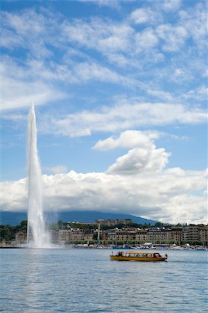 famous places switzerland - Tour Boat on Lake Geneva, Jet D'Eau in Background, Geneva, Switzerland Stock Photo - Rights-Managed, Code: 700-01694366