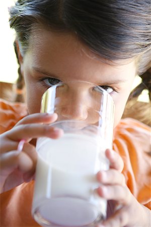 Little Girl Drinking Milk Stock Photo - Rights-Managed, Code: 700-01694472