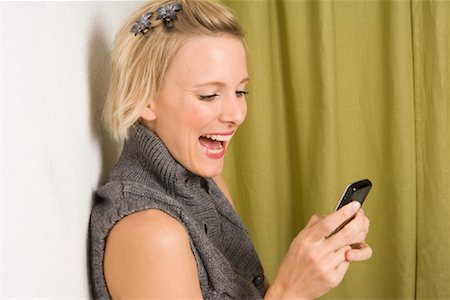 people shocked on phones - Woman Using Cellphone Stock Photo - Rights-Managed, Code: 700-01694580