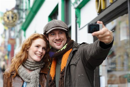 photographer taking photos - Couple Taking Self Portrait in Street, Ireland Stock Photo - Rights-Managed, Code: 700-01694902