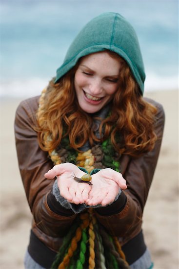 Woman Holding Snail on Beach, Ireland Stock Photo - Premium Rights-Managed, Artist: Masterfile, Image code: 700-01694944