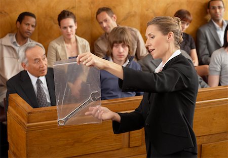 serious blonde woman 40s - Lawyer Showing Evidence to Jury Stock Photo - Rights-Managed, Code: 700-01694968