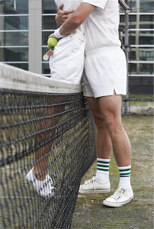 sportsmanship - Joueurs de tennis embrassant chez Net Photographie de stock - Rights-Managed, Code: 700-01695238