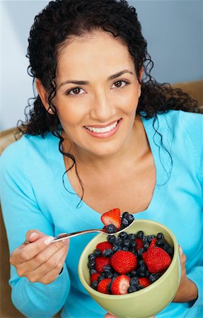 Woman Eating Berries Stock Photo - Rights-Managed, Code: 700-01695363