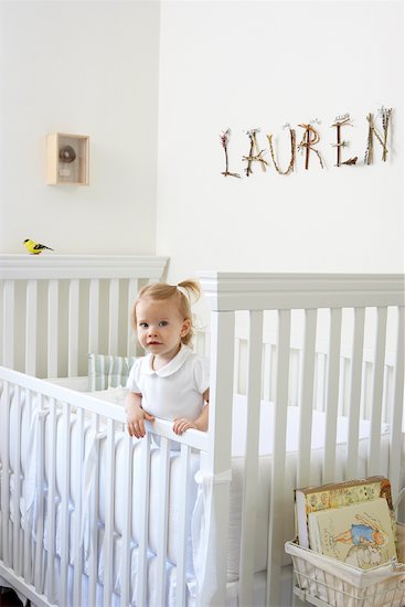 Little Girl Standing in Crib Stock Photo - Premium Rights-Managed, Artist: Michael Alberstat, Image code: 700-01716266