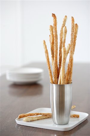 Breadsticks in Cup on Plate Stock Photo - Rights-Managed, Code: 700-01716273