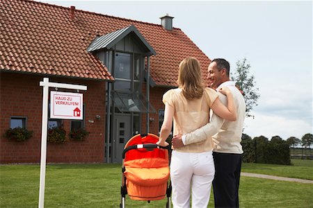 european family home - Couple Standing in Front of House Stock Photo - Rights-Managed, Code: 700-01716470