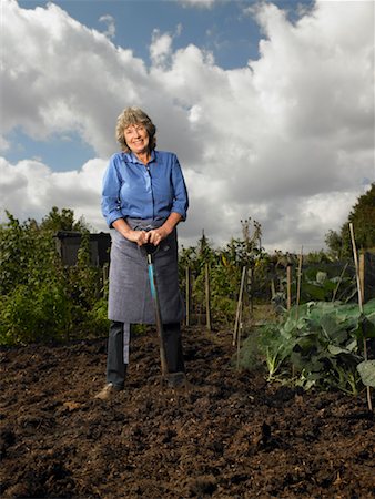 senior woman portrait looking at camera alone full body stand - Portrait of Woman Standing in Garden Stock Photo - Rights-Managed, Code: 700-01718039