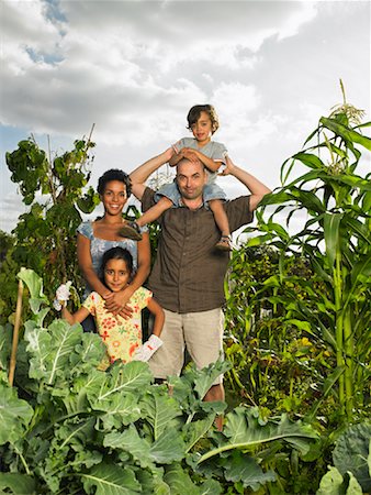 family cornfield photography - Portrait of Family in Vegetable Garden Stock Photo - Rights-Managed, Code: 700-01718065