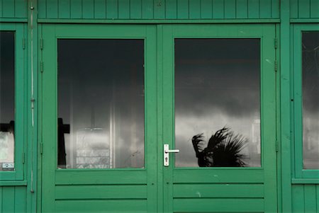 reflection in restaurant window - Sky Reflected in Restaurant Doors, Netherlands Stock Photo - Rights-Managed, Code: 700-01742710